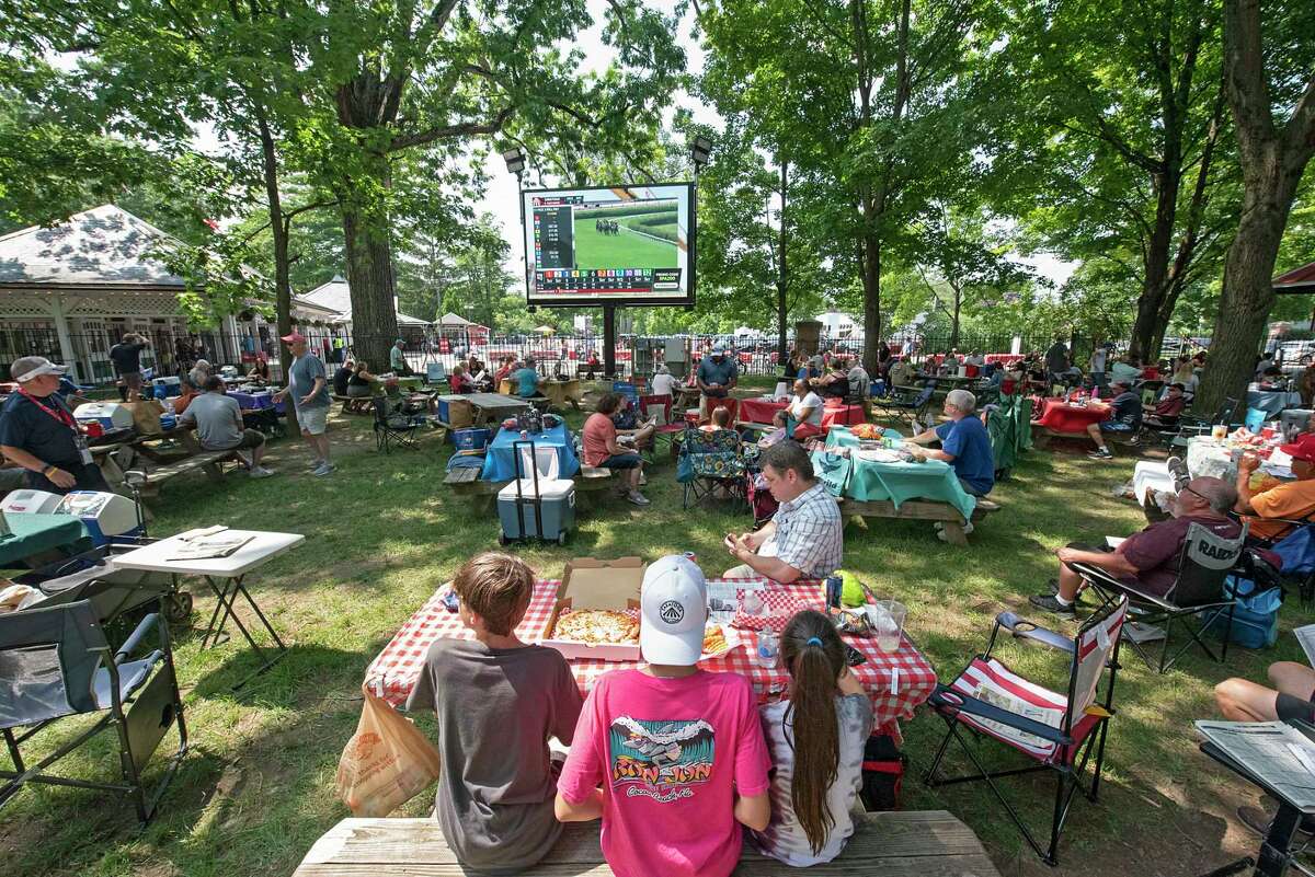 After year away, eager fans invade Saratoga race track
