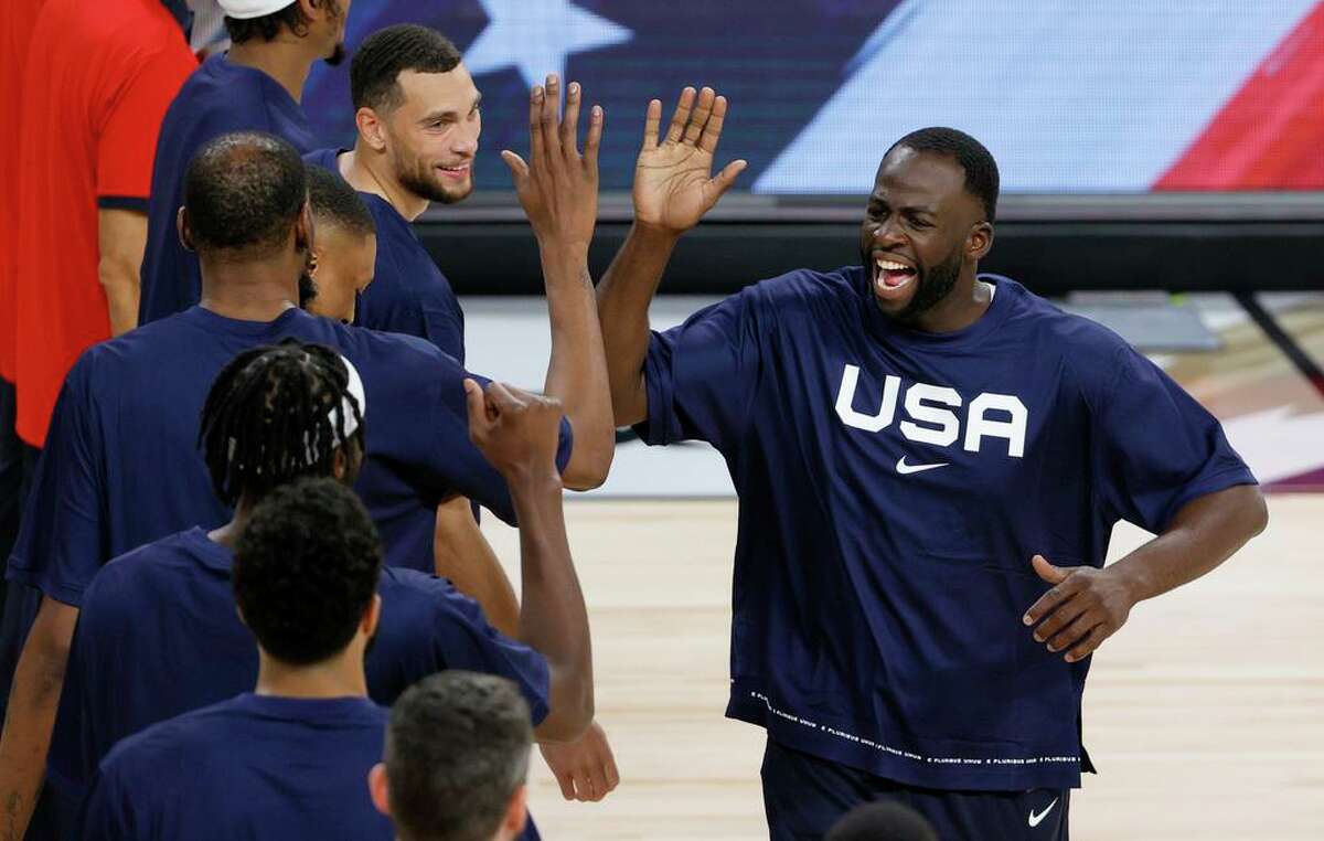 LAS VEGAS, NEVADA - JULY 10: Draymond Green #14 of the United States high-fives Kevin Durant #7 during player introductions before an exhibition game against Nigeria at Michelob ULTRA Arena ahead of the Tokyo Olympic Games on July 10, 2021 in Las Vegas, Nevada. Nigeria defeated the United States 90-87. (Photo by Ethan Miller/Getty Images)
