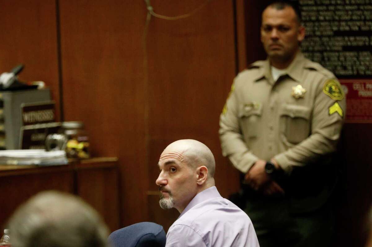 FILE - In this May 29, 2019, file photo, Michael Gargiulo listens to the testimony of actor Ashton Kutcher during Gargiulo's murder trial at Los Angeles Superior Court. Gargiulo has pleaded not guilty to two counts of murder and an attempted-murder charge stemming from attacks in the Los Angeles area between 2001 and 2008, including the death of Kutcher's former girlfriend, 22-year-old Ashley Ellerin. A judge is expected to give a death sentence Friday, Feb. 28, 2020. (Genaro Molina/Los Angeles Times via AP, Pool, File)