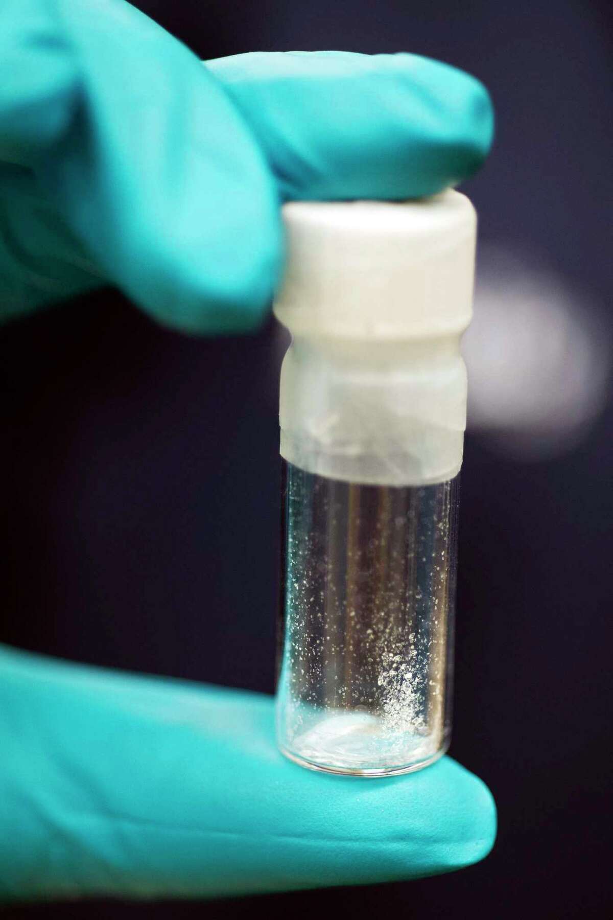 In this Aug. 9, 2016, photo, a vial containing 2mg of fentanyl, which will kill a human if ingested into the body, is displayed at the Drug Enforcement Administration (DEA) Special Testing and Research Laboratory in Sterling, Va.