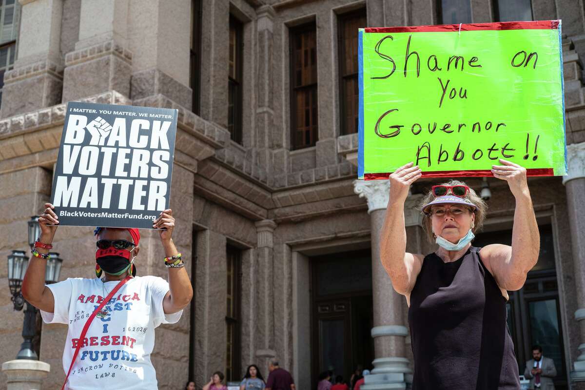 Demonstrators gather outside of the state Capitol on the first day of the 87th Texas Legislature's special session to denounce voter restriction and bills banning the teaching of Critical Race Theory in public schools.