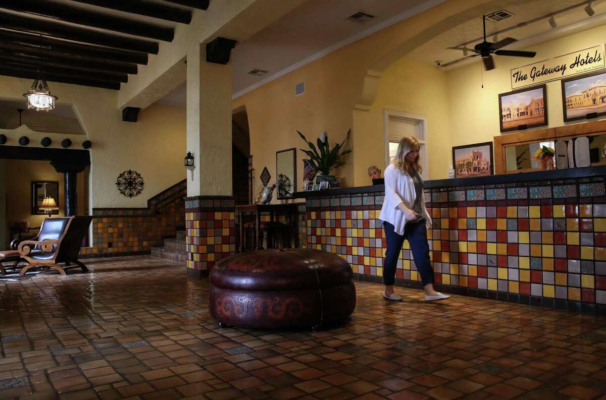Starvanna Cottrell walks through the lobby of Hotel El Capitan on Tuesday, June 29, 2021, in Van Horn. "I always like to say that Van Horn, we're the frontier of agriculture and railroad," she said. "But now we've become like this frontier of space."
