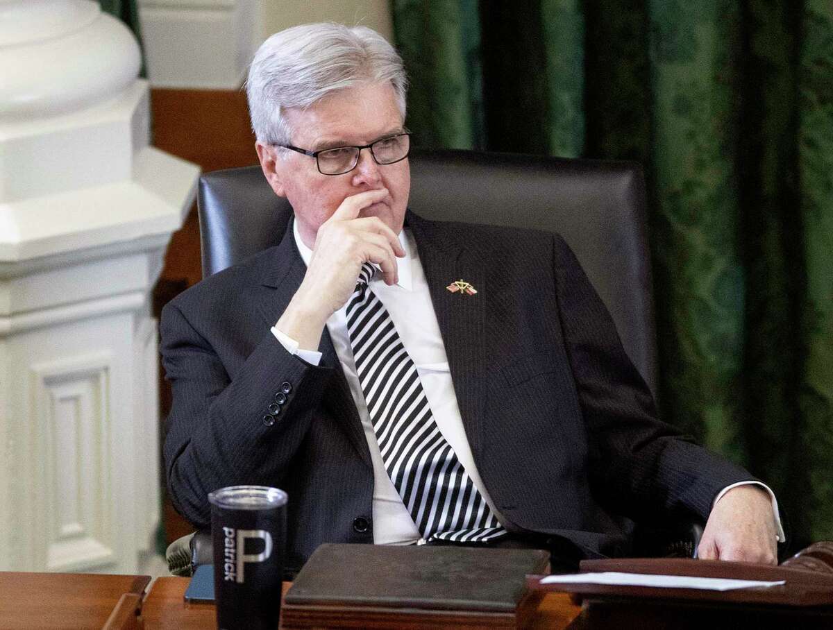 FILE - In this March 30, 2021 file photo, Texas Lt. Gov. Dan Patrick listens during debate in the Senate Chamber at the Capitol in Austin.