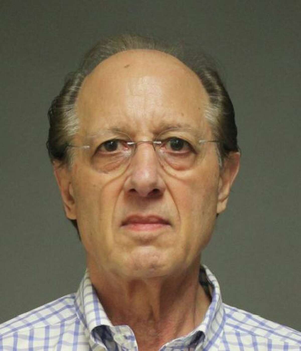 Former Fairfield Chief Fiscal Officer Robert Mayer was charged with third-degree burglary, third-degree larceny and tampering with evidence.