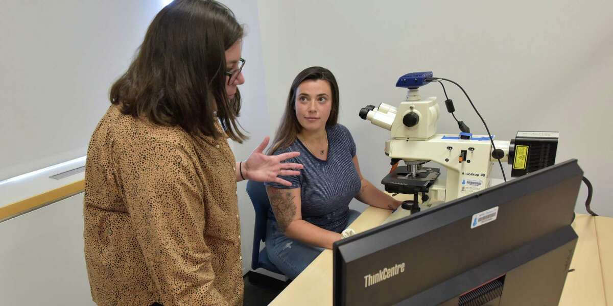 Western Connecticut State University has opened a new miscroscopy lab. It was first used in April 2021. From left to right: Assistant Professor of Biology Kristin Giamanco and recent graduate Krisa FitzGerald.