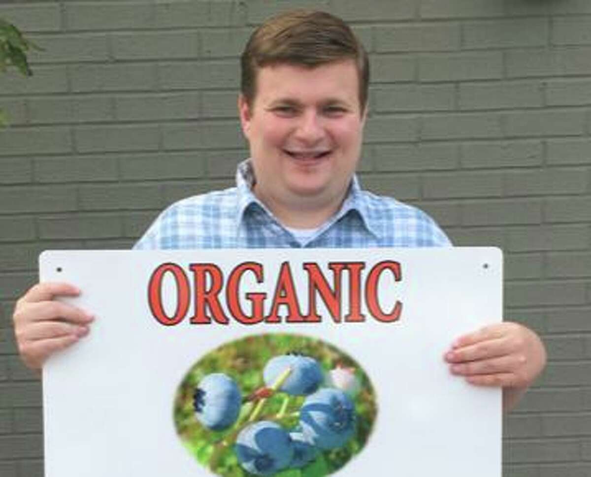 Graham Orzulak and others from Greenwich-based Abilis will be selling organic blueberries around town as part of the Grahamberries program, a unique partnership with an organic blueberry farm in upstate New York.
