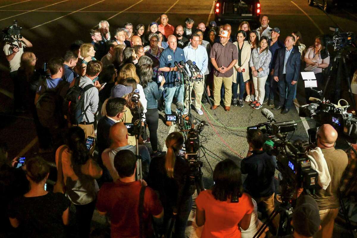 Texas House Democrats speak to reporters on July 12 after arriving at Dulles International Airport from Austin in a second high-profile effort to block Republican legislation on voting laws.