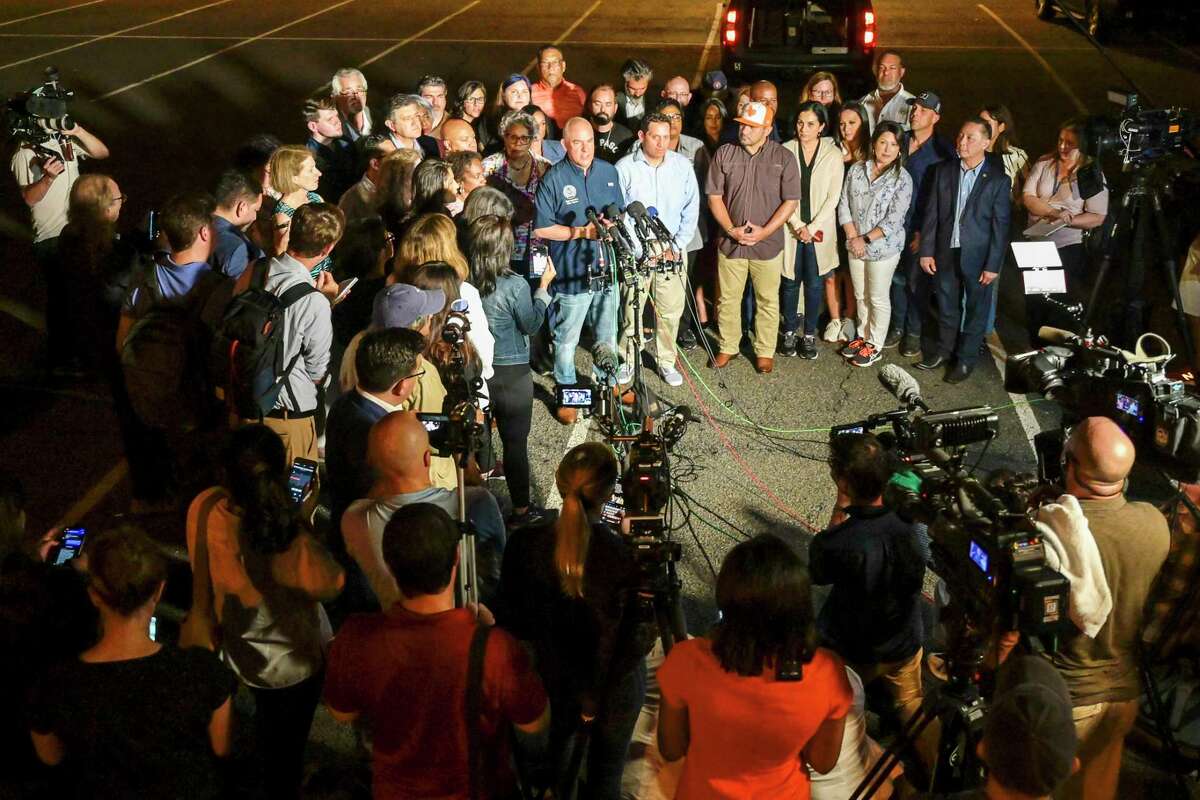 Texas House Democrats speak to reporters on July 12 after arriving at Dulles International Airport from Austin in a second high-profile effort to block Republican legislation on voting laws. MUST CREDIT: photo for The Washington Post by Craig Hudson.