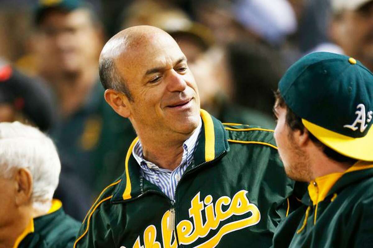 A’s owner John Fisher, at a 2016 home game, has let sidekick Dave Kaval and Commissioner Rob Manfred do his talking.