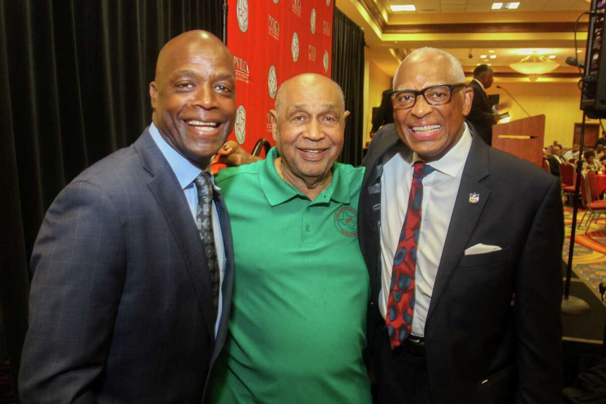 Darrell Green, from left, Robert Brown and Leroy Mitchell at the Prairie View Interscholastic League Coaches Association's annual Hall of Fame banquet at the Houston Marriott South at Hobby Airport in Houston on July 17, 2021.