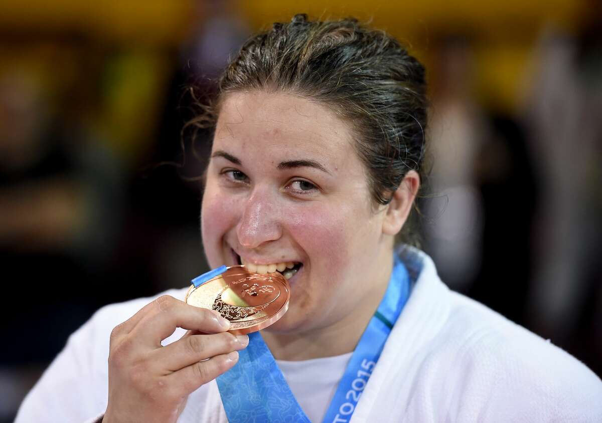 TORONTO, ON - JULY 14: Nina Cutro-Kelly of the United States of America celebrates her bronze medal in the plus 78kg judo during the 2015 Pan Am games at the Mississauga Sports Centre on July 14, 2015 in Toronto, Canada. (Photo by Harry How/Getty Images)