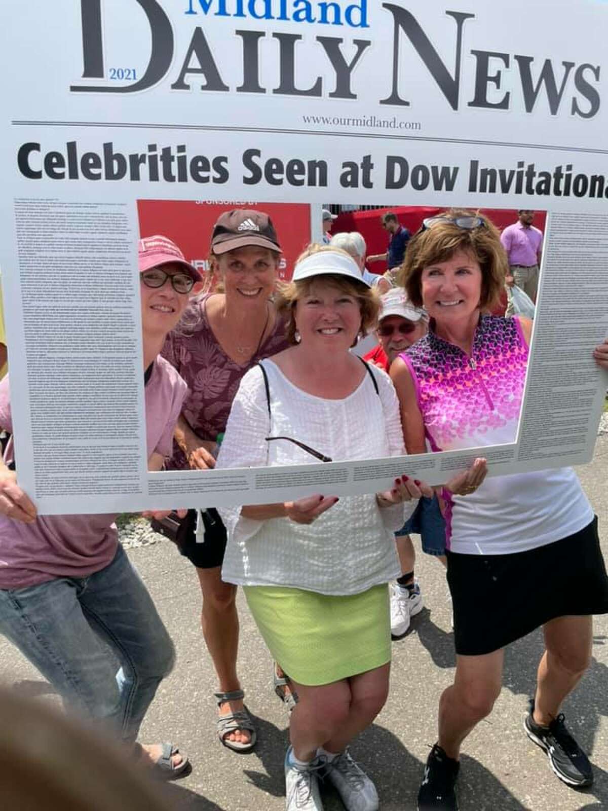 Spectators, volunteers, players, and others took the opportunity to have their Midland Daily News