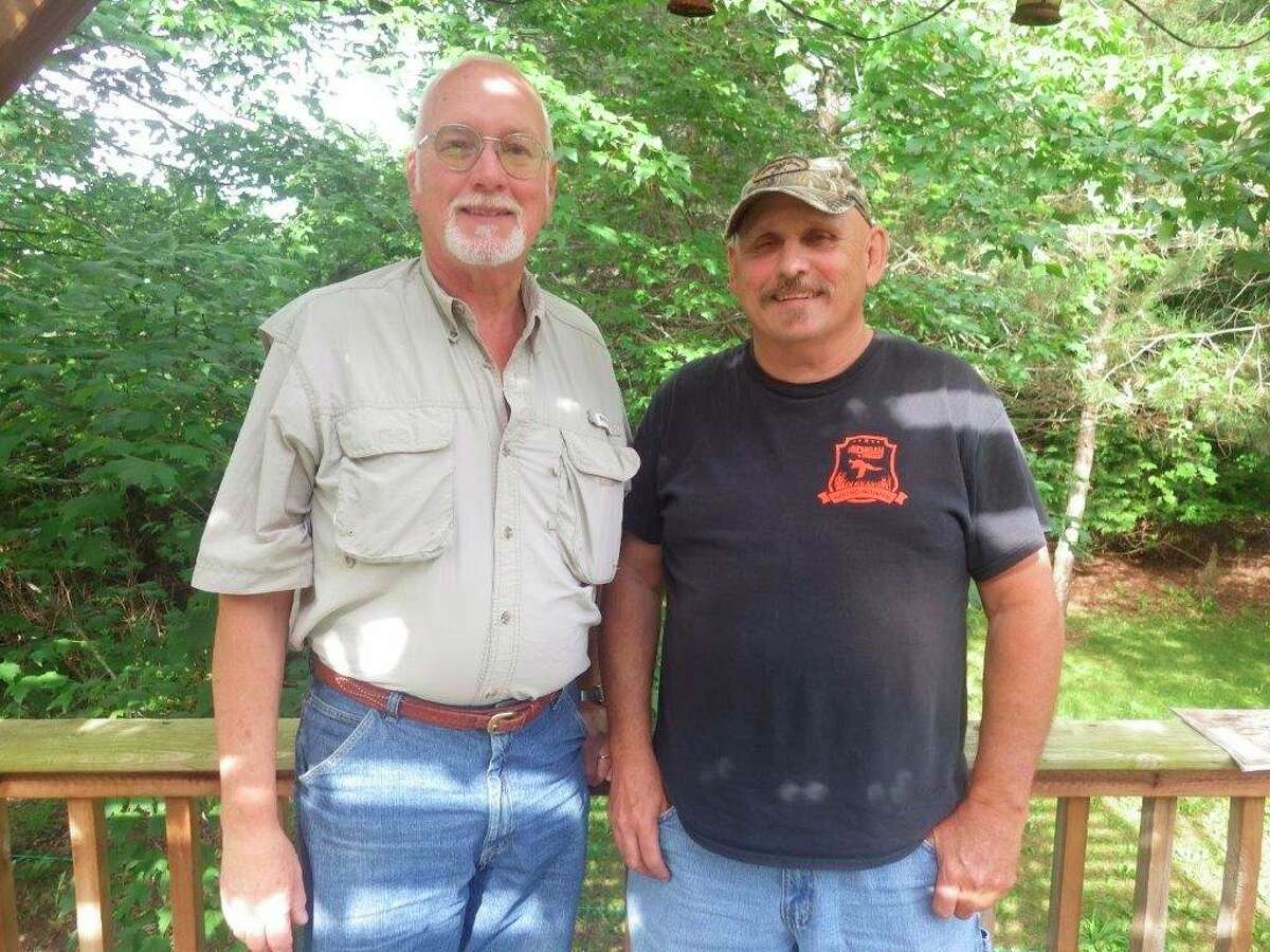 Carl Griffin of Imlay City (left) and Ken Dalton of Lapeer (right) of the Michigan Pheasant Hunting Initiative (MPHI) hope that the new pheasant hunting license will boost hunter numbers and interest in small-game hunting. The new license is the brainchild of Dalton, who goes by the title "Mr. Pheasident." (Tom Lounsbury/Hearst Michigan)