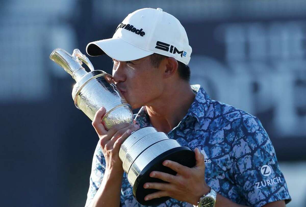 Cal alumnus Collin Morikawa kisses the Claret Jug on the 18th green after winning the British Open at Royal St. George’s.