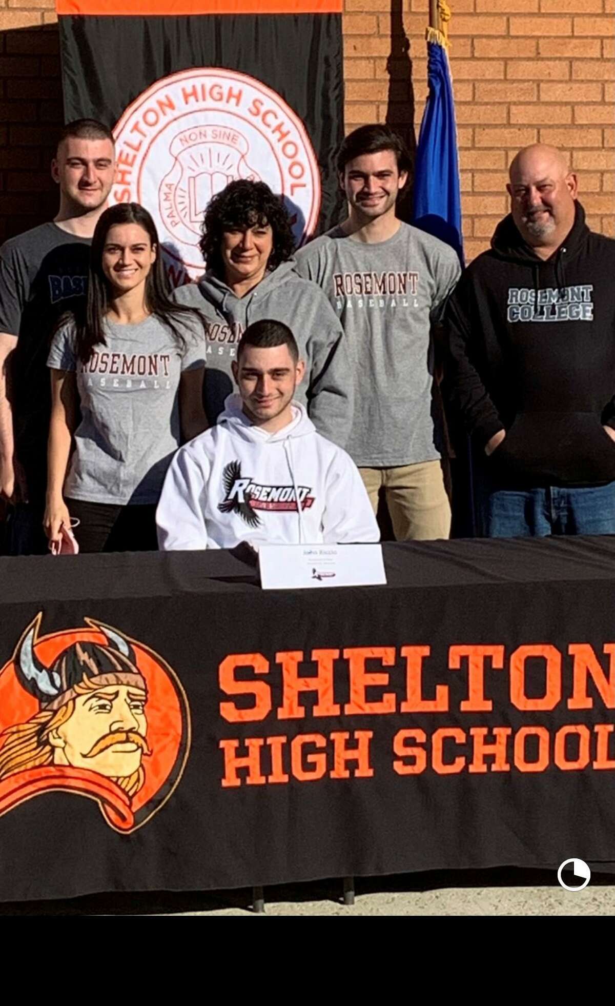 John Riccio signed to play baseball at Rosemont College in Pennsylvania in a ceremony at Shelton High. Joining him were brother Luke, sister Mikayla, mom Lucille, brother Michael and dad Mike.