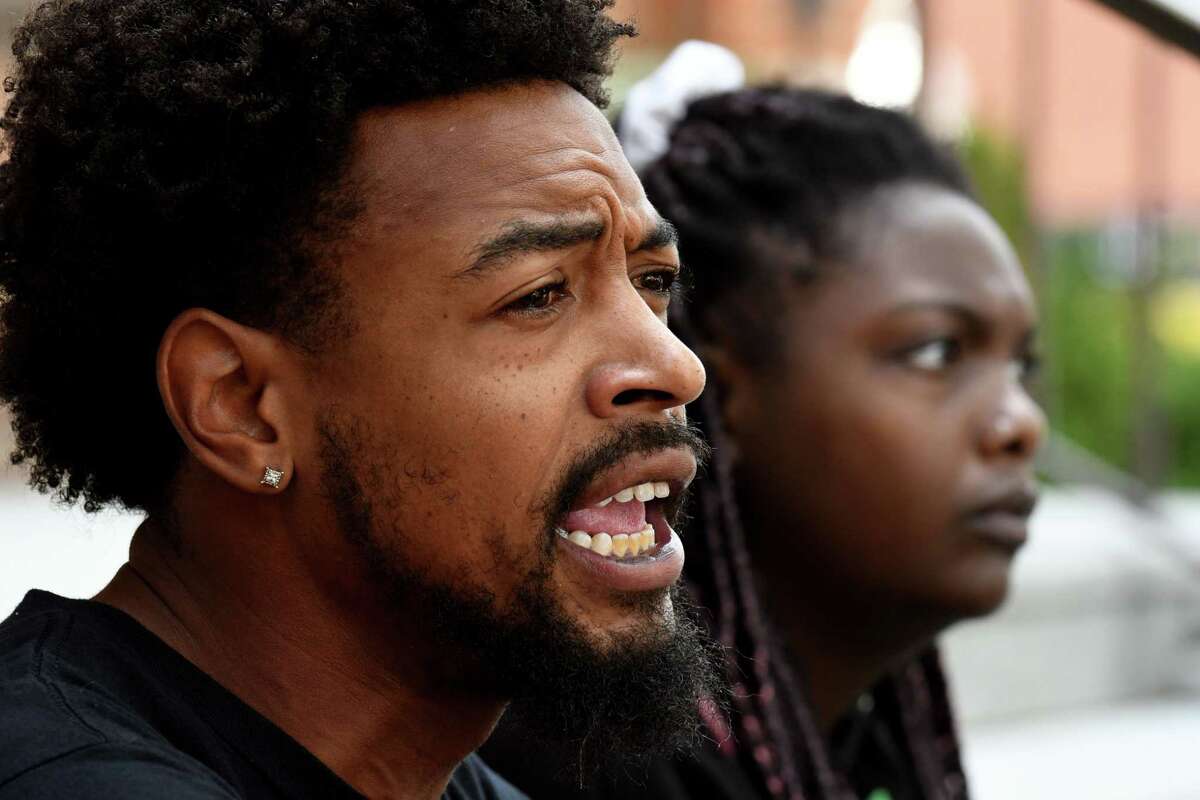 Lexis Figuereo of Saratoga Black Lives Matter criticizes the forceful response from police to a BLM demonstration outside Congress Park, which he said was unjustified on Monday, July 19, 2021, during a press conference on the steps of Saratoga City Hall in Saratoga Springs, N.Y. Five people were arrested after protesters marched through downtown Saratoga, calling for city officials to apologize for recent remarks they made about activists in the city. Police responded in tactical gear, forcing protesters off the street. (Will Waldron/Times Union)