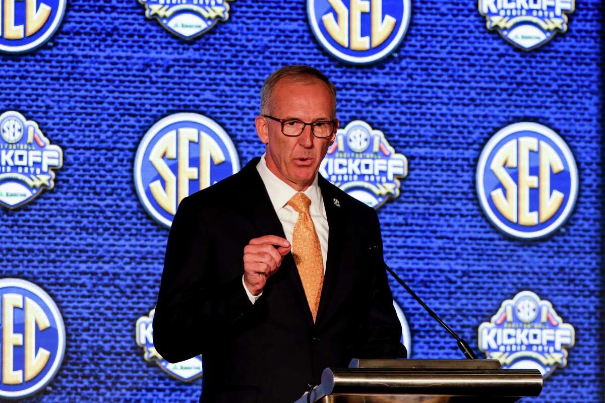 SEC Commissioner Greg Sankey speaks to reporters during the NCAA college football Southeastern Conference Media Days Monday, July 19, 2021, in Hoover, Ala. (AP Photo/Butch Dill)