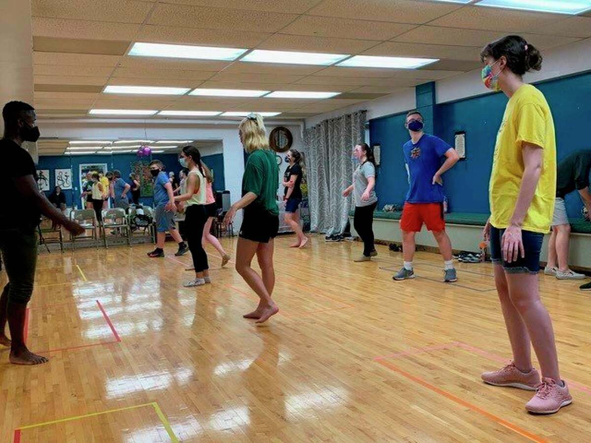 Teenage Musicals, Inc.'s young actors recently participated in a dance workshop with Broadway performer James T. Lane. (Photo provided)