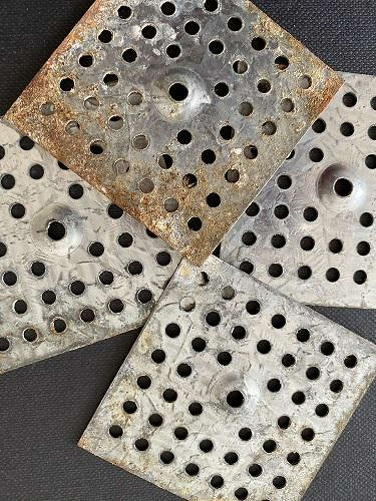 Chester Historical Society is holding its ninth Farm Finds Creative Challenge. Pictured are two inch metal squares from a historical Chester farm that will be transformed by local artists.