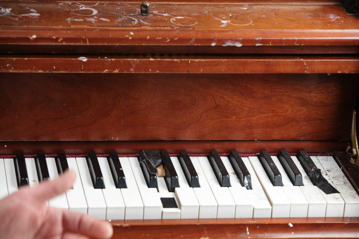 Some of the keys on Brandy Collins' used piano on the back of his Sprinter van are showing signs of wear and tear when parked in the Haight-Ashbury neighborhood of San Francisco on July 16, 2021.