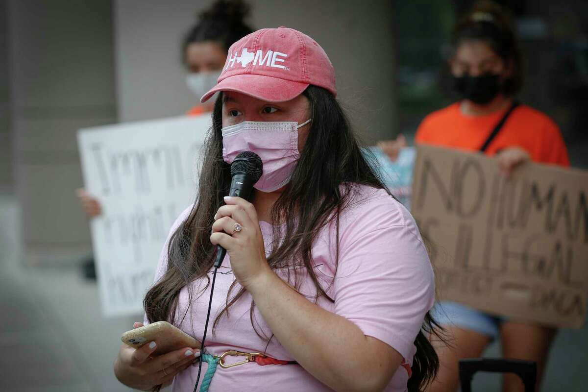 Susie Lujano talks about being a DACA recipient during a press conference and rally, organized by United We Dream outside the downtown U.S. District Court building Monday, July 19, 2021, in Houston.