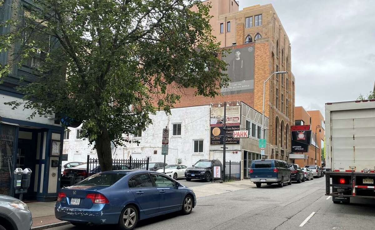A 106-unit apartment complex is proposed for the parking lot, and to replace the 2- story structure next to it, in addition to a rehab of LoRicco Towers on Crown Street.