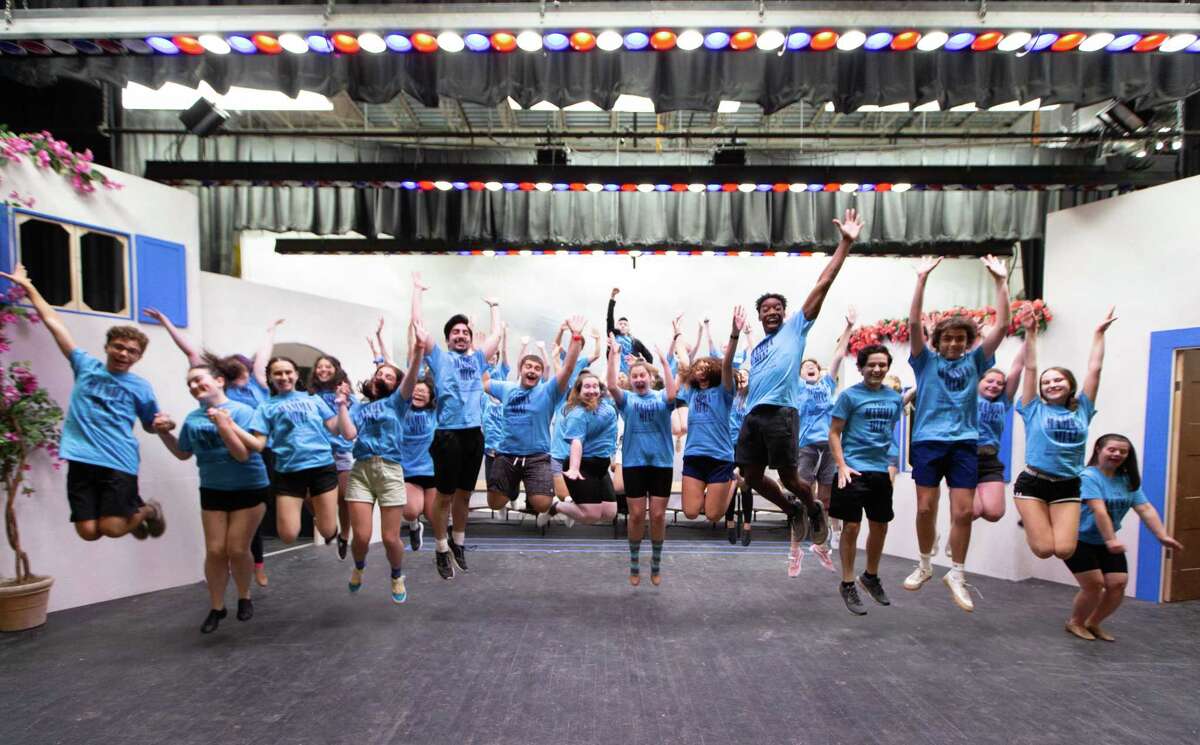 Members of the Trumbull Youth Association rehearse a scene from Mamma Mia!