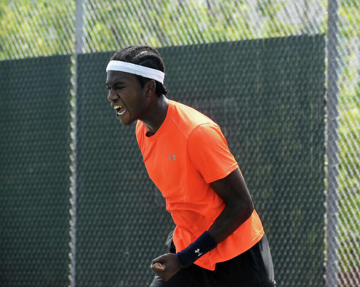 Jibril Nettles celebrates Tuesday after clinching a win over Kalman Boyd inside the EHS Tennis Center to earn a spot in the Main Draw of the Edwardsville Futures tennis tournament.