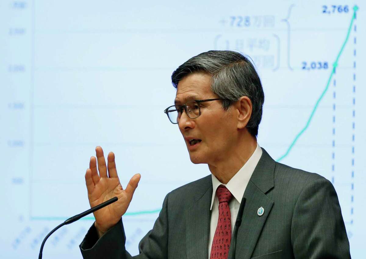 FILE - In this June 17, 2021, file photo, President of the Japan Community Health Care Organization Shigeru Omi attends a joint news conference with Japan's Prime Minister Yoshihide Suga on Japan's response to the coronavirus outbreak at Suga's official residence in Tokyo. The Tokyo Olympics are going ahead despite opposition from many quarters inside Japan. The Japanese medical community is largely against it. Omi has said it's "abnormal" to hold the Olympics during a pandemic. (Issei Kato/Pool Photo via AP)