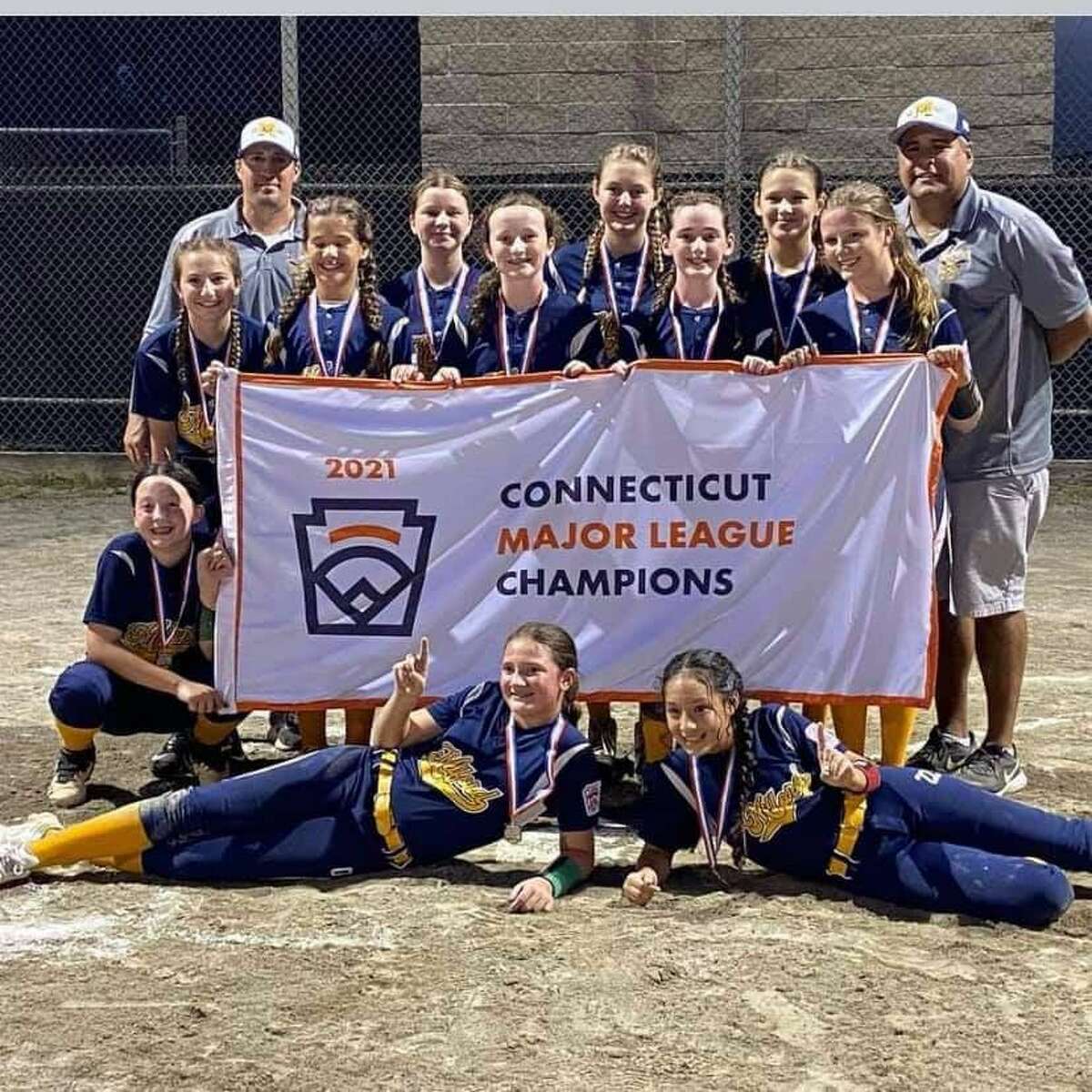 Milford Little League softball won four straight games to earn the right to represent Connecticut in the East Regional in Bristol. Team members (in front) Abby Corris and Emily Roos; (second row) Sophia Scarpa, Sarah Donegan, manager Brian Corris, Gabby Rodriguez, Erika Fabian, Charlotte Doyle, Olivia Gregory, Maddie Deldin, Cassie Rodriguez, Maya Fallon-Silva and coach Dave Rodriguez.