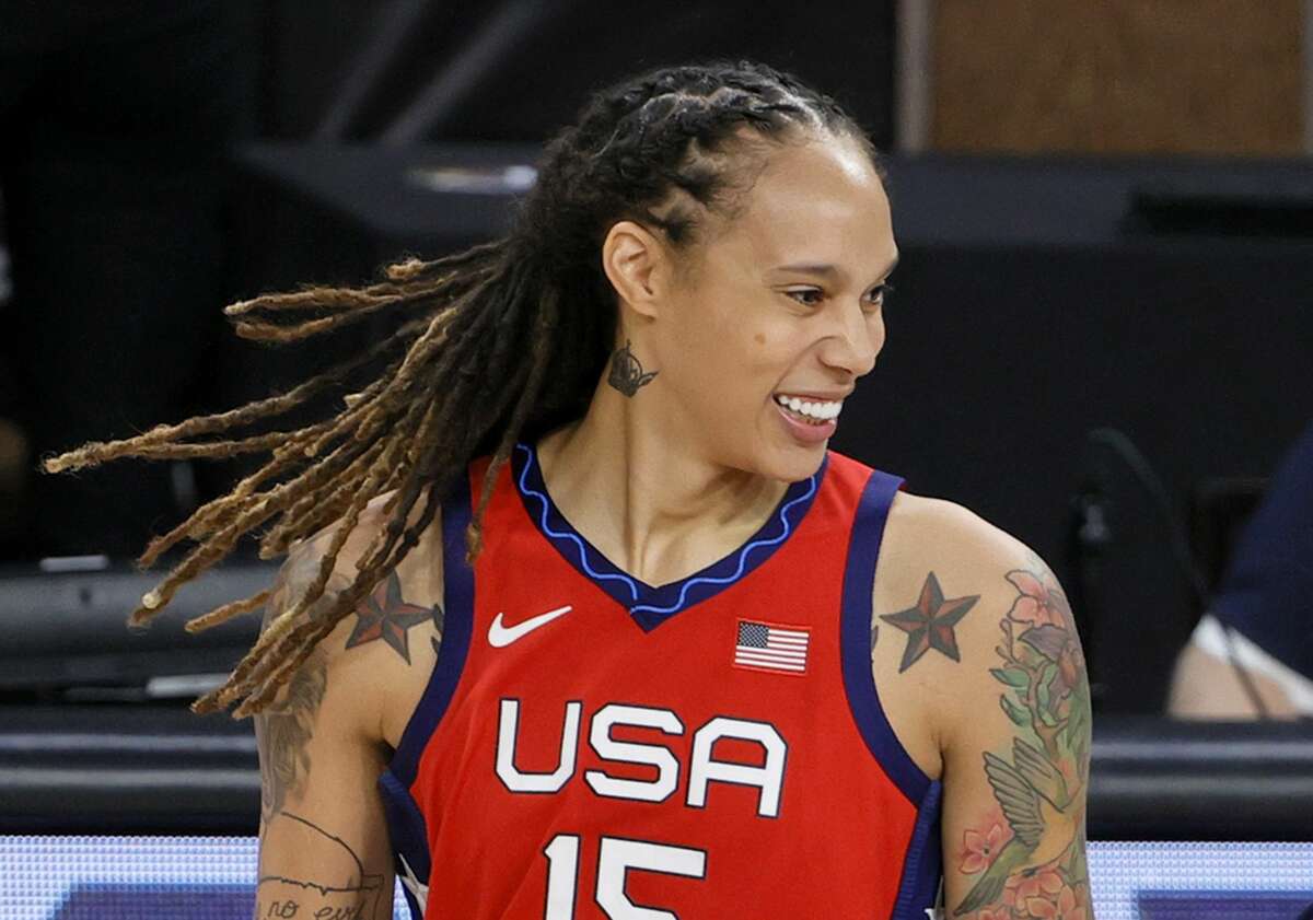 LAS VEGAS, NEVADA - JULY 16: Brittney Griner #15 of the United States smiles while greeting players after an exhibition game against the Australia Opals at Michelob ULTRA Arena ahead of the Tokyo Olympic Games on July 16, 2021 in Las Vegas, Nevada. Australia defeated the United States 70-67. (Photo by Ethan Miller/Getty Images)