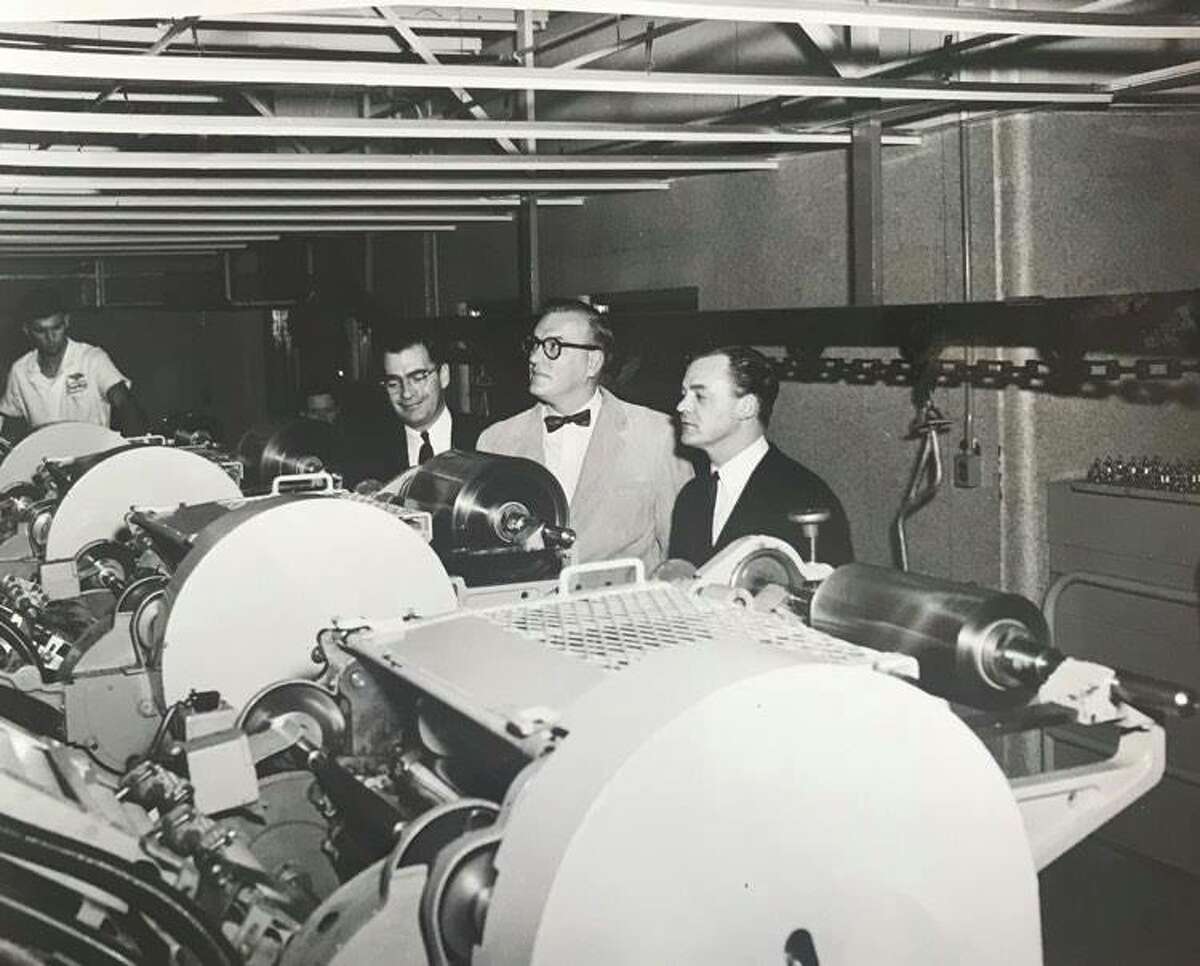 Dave Garroway with unknown men at the Dow Chemical Co. Saran Wrap plant. (circa 1950s, submitted by Karen Postma of Midland)