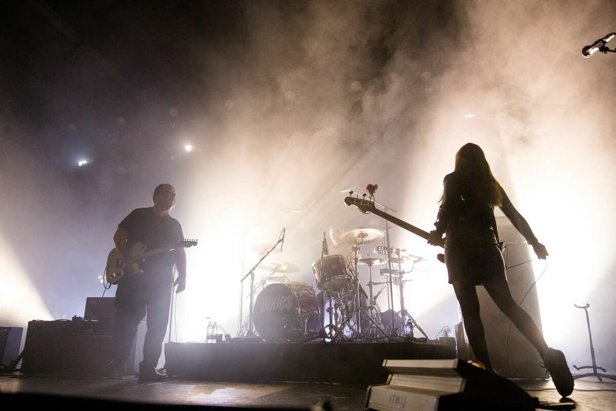 BERLIN, GERMANY - OCTOBER 05: (L-R) Black Francis and Paz Lenchantin of Pixies perform live on stage during a concert at the Columbiahalle on October 05, 2019 in Berlin, Germany. (Photo by Jana Legler/Redferns)