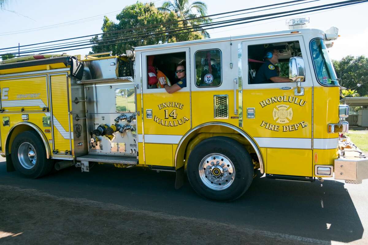 FILE - Honolulu Fire Department heads back to the station after responding to an incident.
