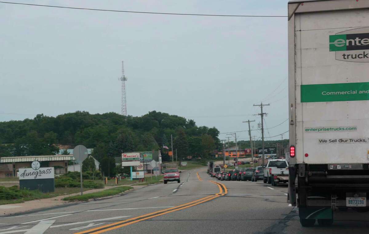 Traffic was backed up to the south of M-55 near  Monroe Street in Manistee before noon on Thursday. (Jeff Zide/News Advocate)