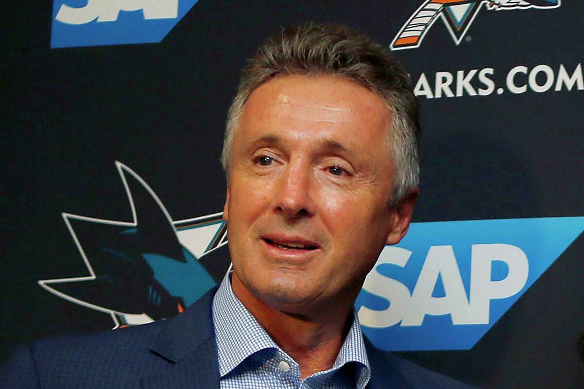 FILE - In this Sept. 19, 2018, file photo, San Jose Sharks general manager Doug Wilson is shown during a news conference in San Jose, Calif.