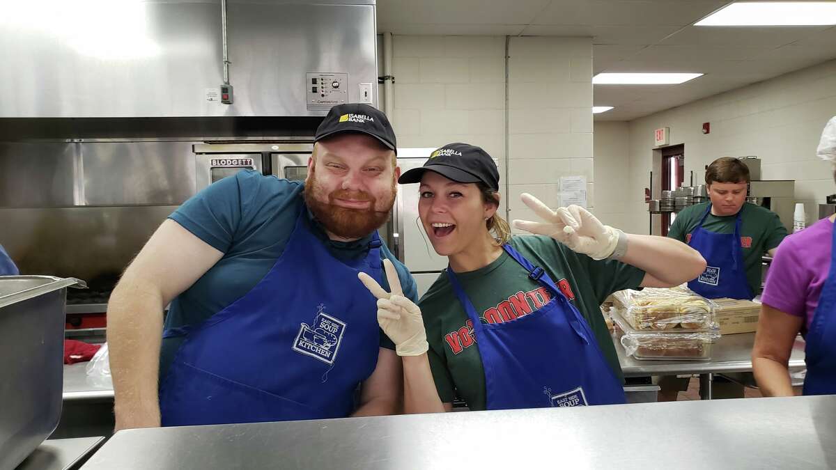 Volunteers from the United Way of Midland County, the Great Lakes Loons and Isabella Bank spent the morning of Wednesday, July 21, 2021 preparing and serving meals with Hidden Harvest and East Side Soup Kitchen in Saginaw. (Photo provided/United Way of Midland County)