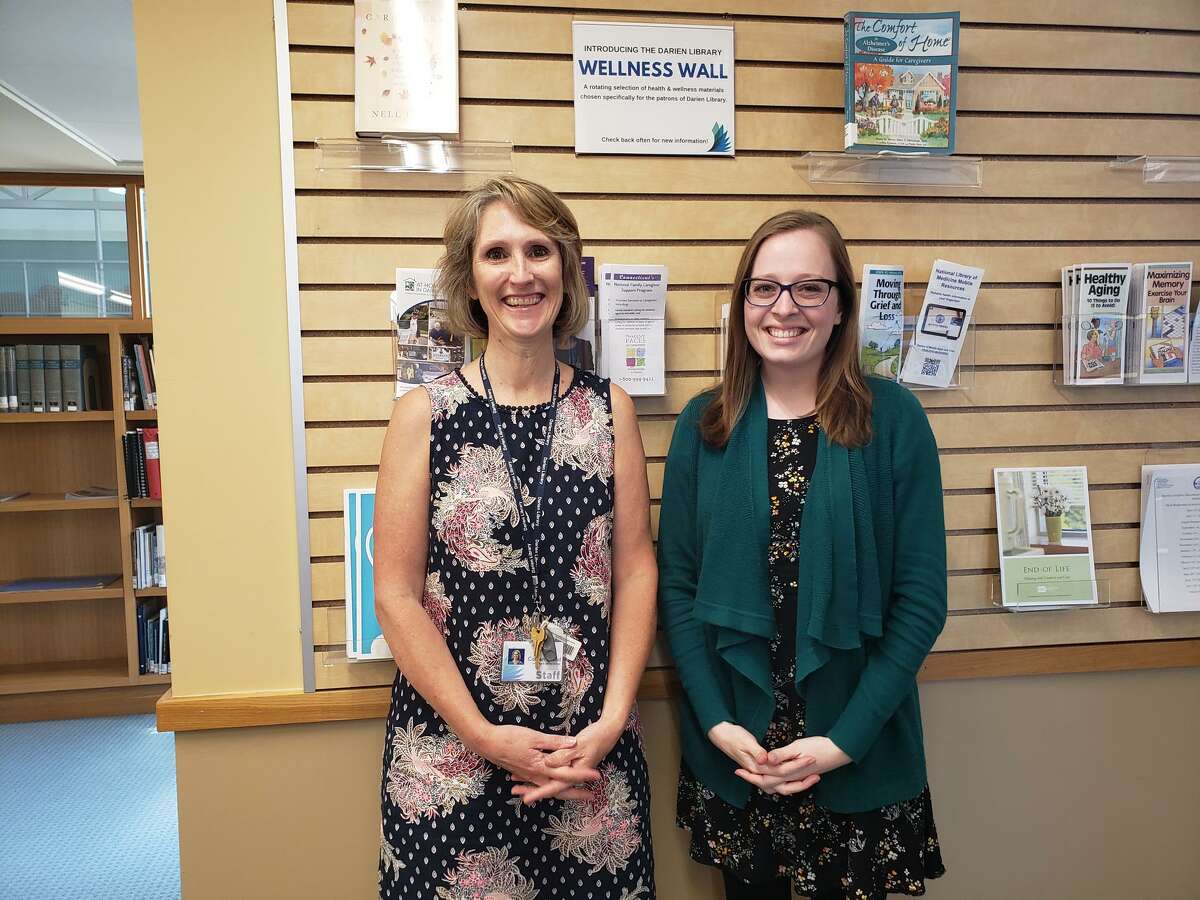 Darien Library Knowledge and Learning Services Librarian Colleen Wood, and Darien Library Head of Knowledge and Learning Services Librarian Brittany Netherton, are pictured at the library in the town in a previous year. The library previously started a new, and free program called Caregiver Cafe, which provides respite to caregivers. The caregivers can bring the person, who is in their care, with them to the library. Many people experience a connection to the dead that can only be described as a haunting. "In Healing and Hauntings," the library is presenting an opportunity for attendees to share their experiences with the dead on Wednesday, August 4, at 7 p.m.