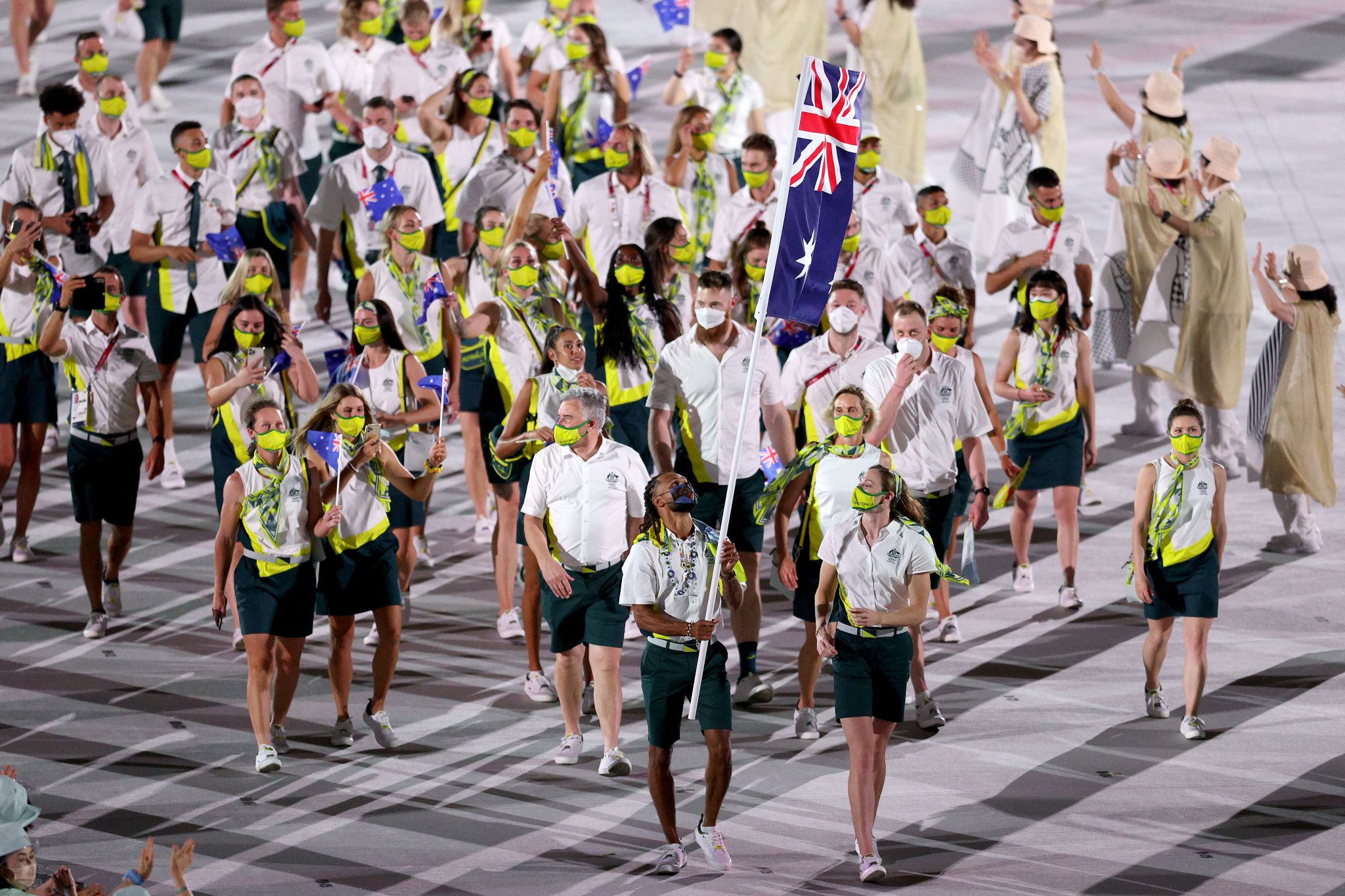 Patty Mills makes Olympics history as Australia's flag bearer