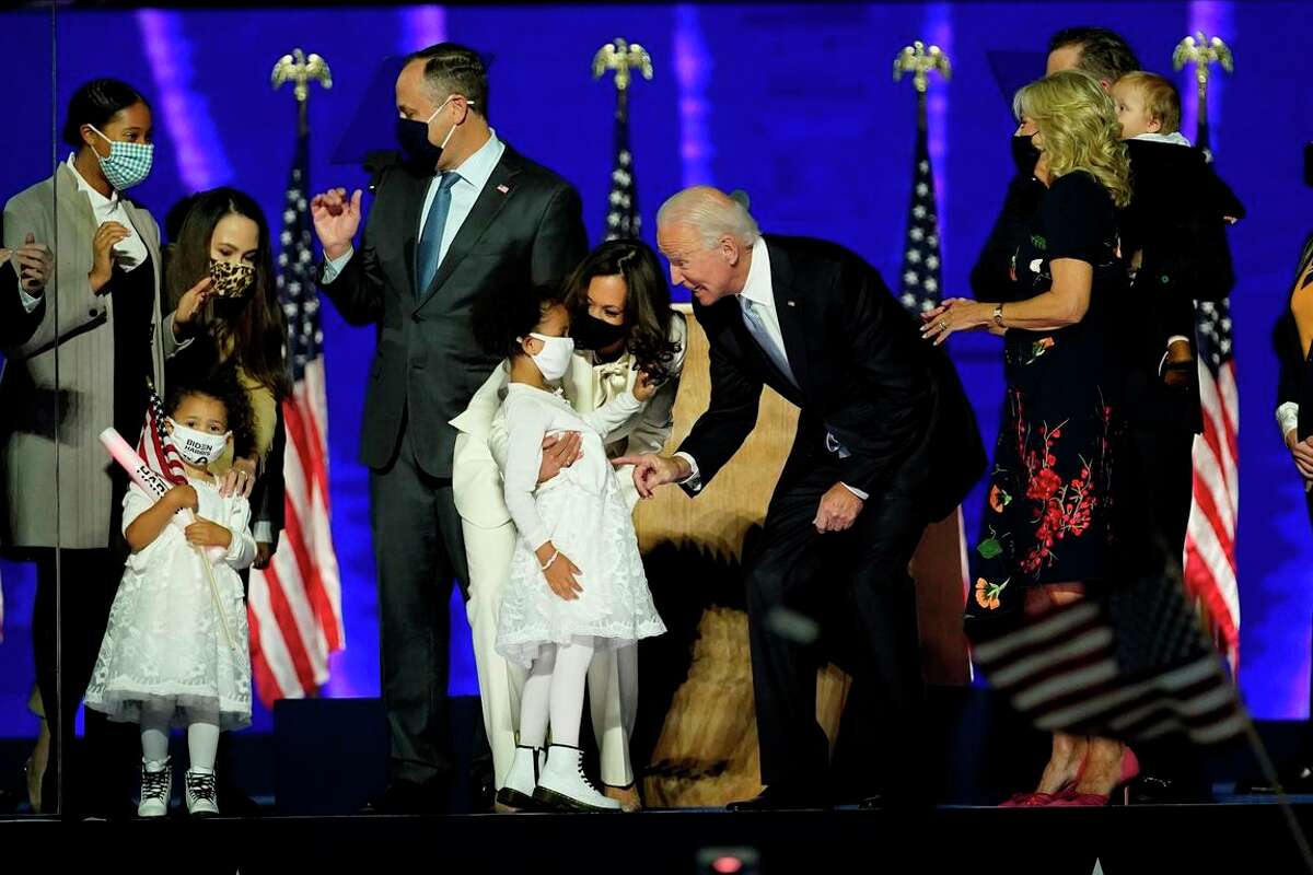 President-elect Joe Biden and Vice President-elect Kamala Harris mingle with family members in Wilmington, Del., after winning the November election.
