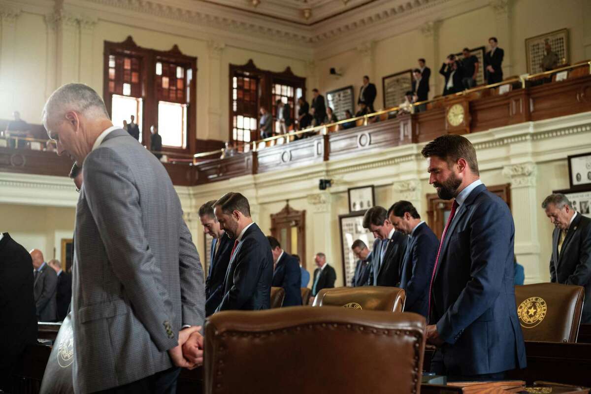 Texas state representatives bow their heads in prayer in the House chamber during an invocation at the start of this far-from-special session. Once again, lawmakers are looking to limit what history social studies teachers can share with students. It’s absurd.