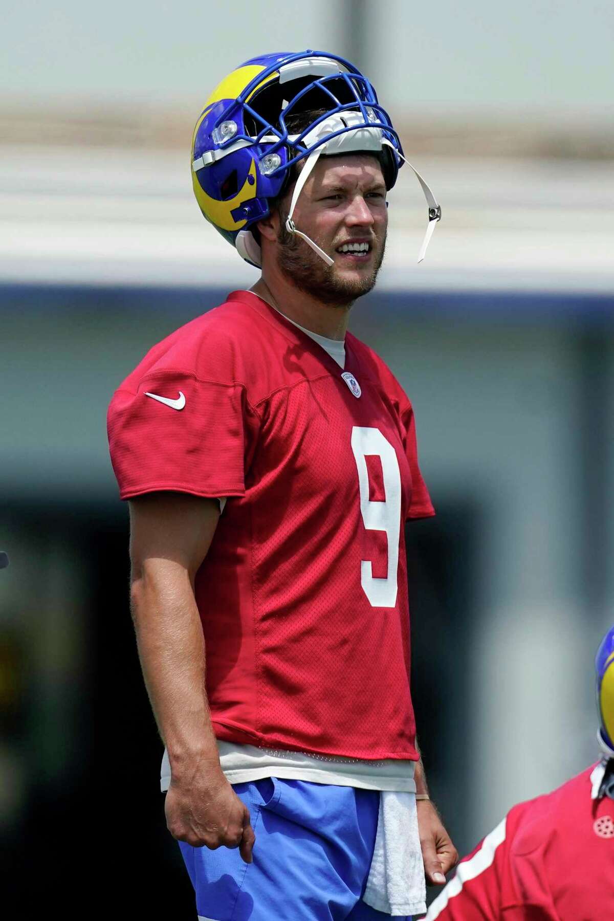 Los Angeles Rams quarterback Matthew Stafford stands on the field during an NFL football practice Tuesday, June 8, 2021, in Thousand Oaks, Calif. (AP Photo/Mark J. Terrill)
