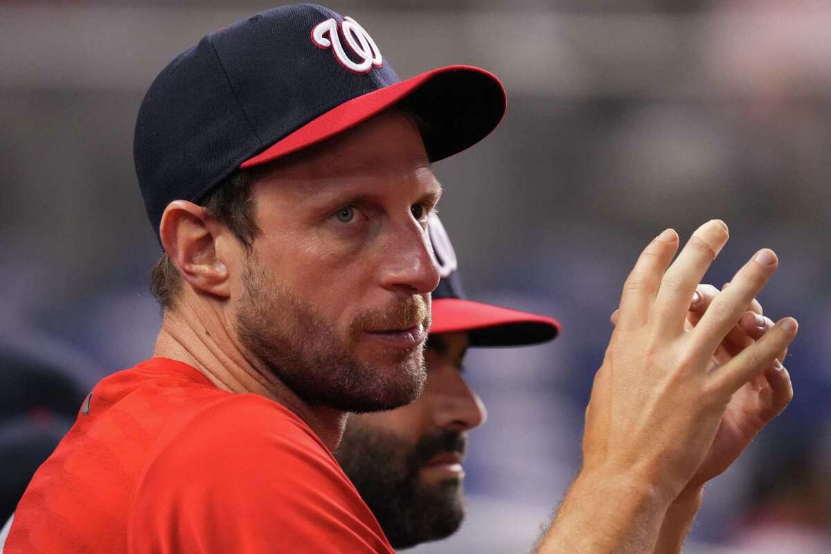 MIAMI, FLORIDA - JUNE 24: Max Scherzer #31 of the Washington Nationals looks on from the dugout in the eighth inning against the Miami Marlins at loanDepot park on June 24, 2021 in Miami, Florida. (Photo by Mark Brown/Getty Images)
