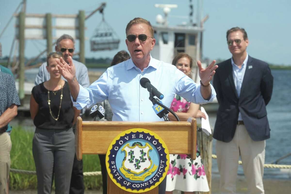 Governor Ned Lamont speaks at a news conference in Stratford, Conn. July 23, 2021. Lamont was joined by other state and local officials to sign a legislative bill that will implement new policies designated to support continued growth of the state’s shellfish industry.