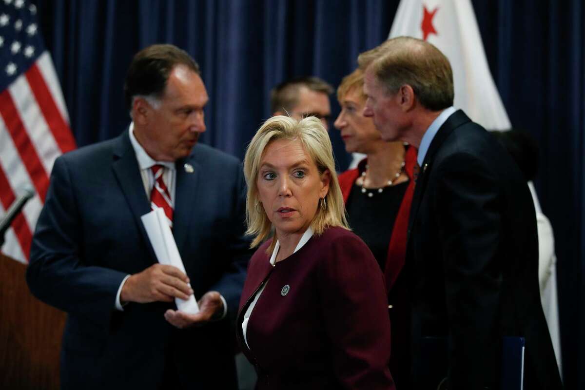 Sacramento County District Attorney Anne Marie Schubert, center, at a news conference in 2018.