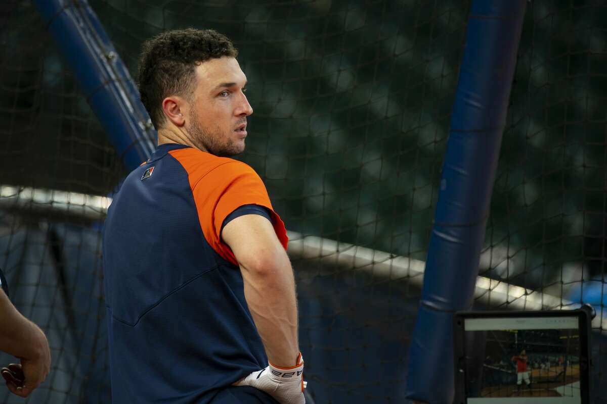 Houston Astros third baseman Alex Bregman takes batting practice before a game between the Houston Astros and Texas Rangers on Friday, July 23, 2021, at Minute Maid Park in Houston.