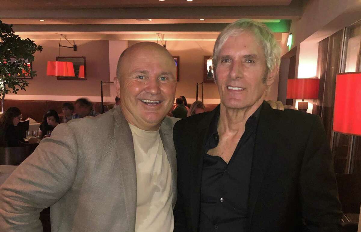 Tony Capasso of Tony's at the JHouse poses for a photo at his restaurant in Riverside with singer/songwriter Michael Bolton, who lives in Westport, on Tuesday, July 20, 2021.