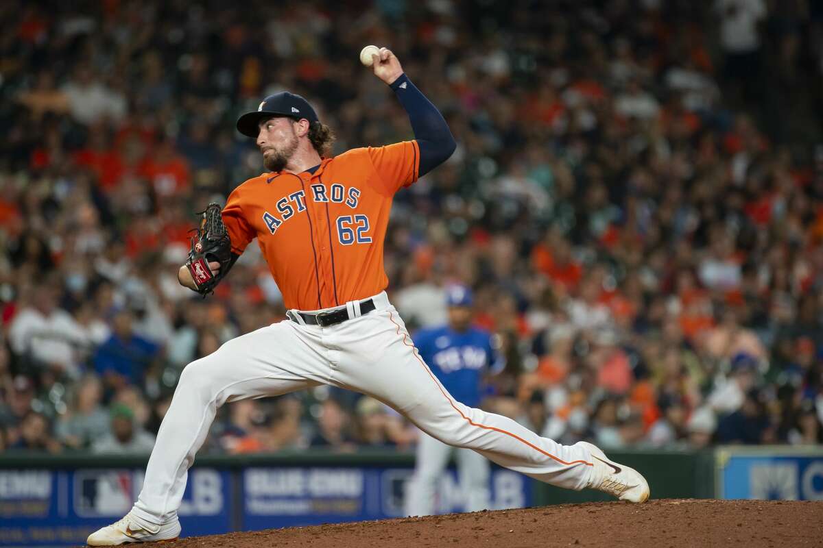 Houston Astros relief pitcher Blake Taylor (62) pitches during the eighth inning of a game between the Houston Astros and Texas Rangers on Friday, July 23, 2021, at Minute Maid Park in Houston.