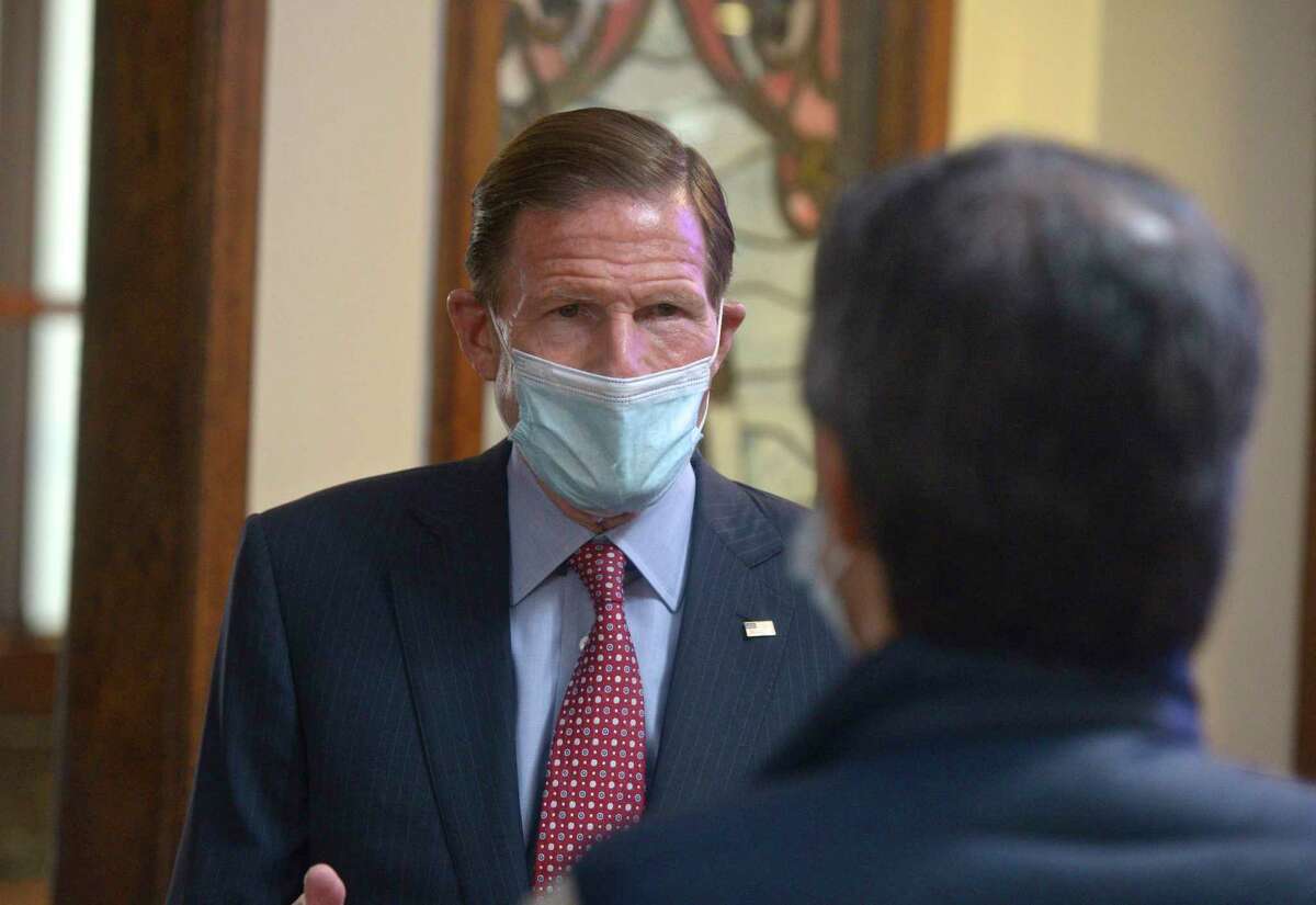 U.S. Senator Richard Blumenthal, left, highlighted new federal assistance available to restaurants during a conversation with Wilson Hernandez owner of La Mitad de Mundo Restaurant, in Danbury, Conn, on Monday, May 3, 2021.