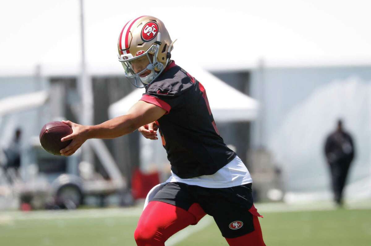 49ers quarterback Trey Lance (5) practices at 49ers headquarters on Wednesday, June 2, 2021 in Santa Clara, Calif.